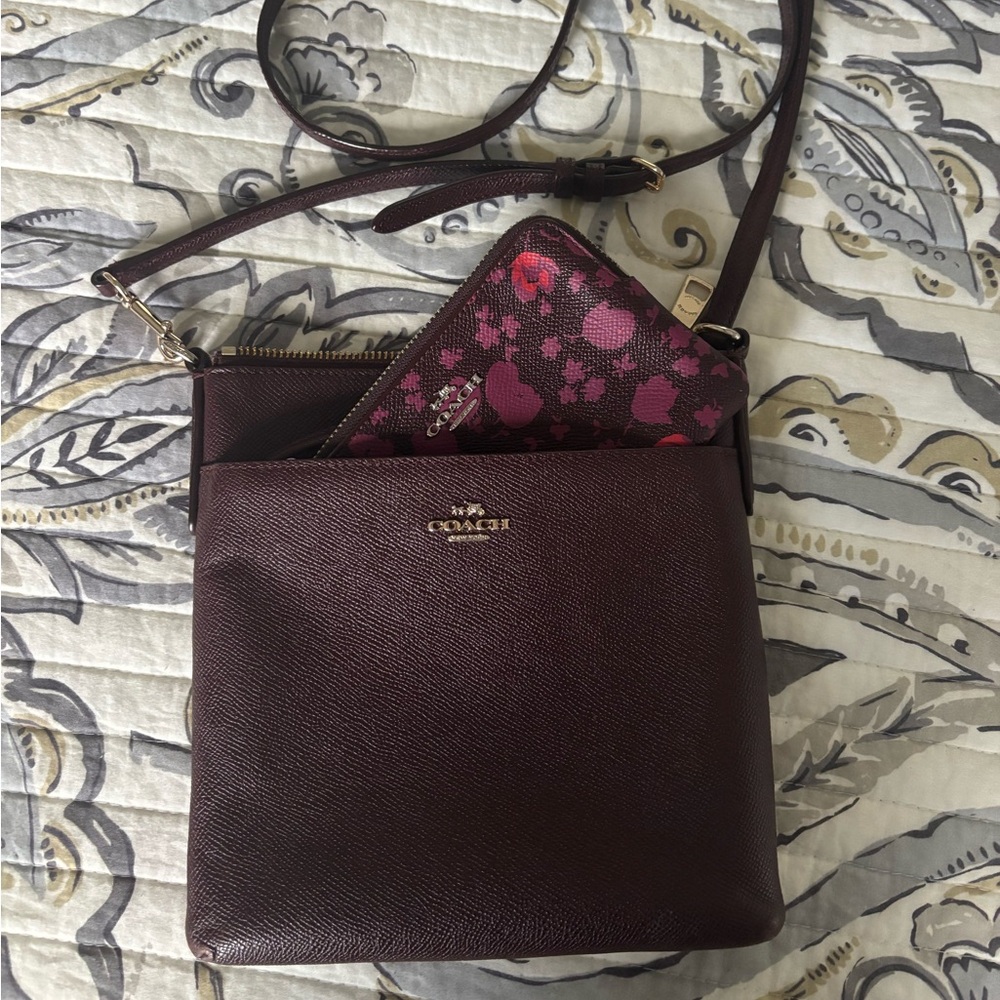 Coach cross body in burgundy with matching wristlet coin purse